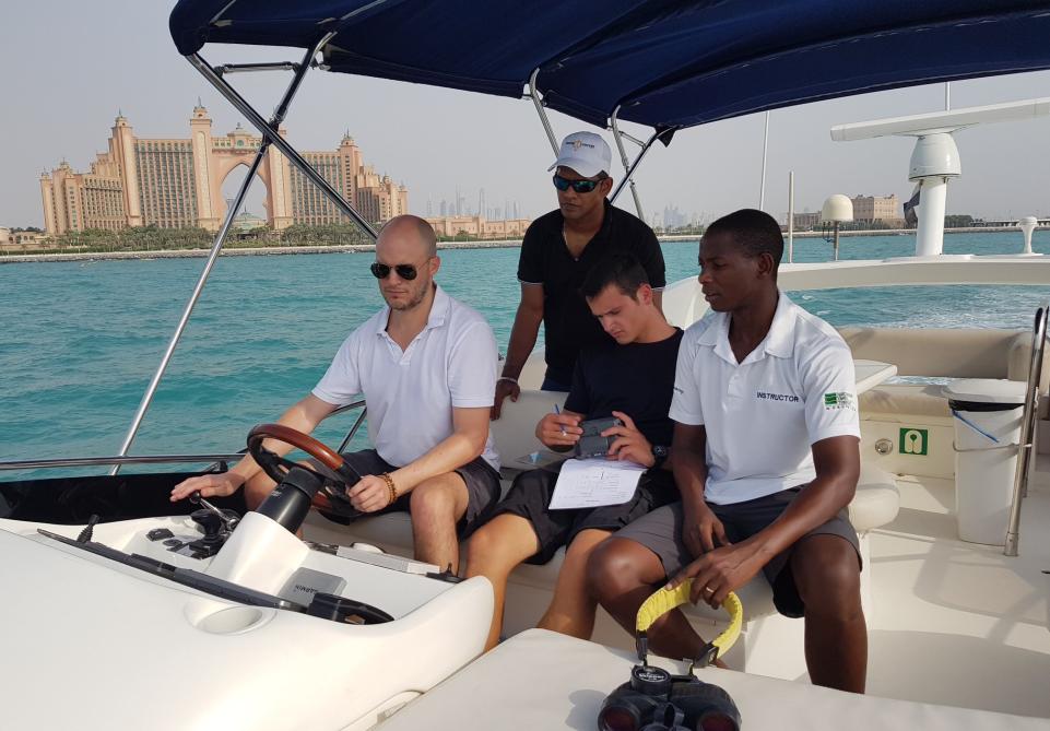 Person driving a motorboat, illustrating whether you need a license to drive a boat